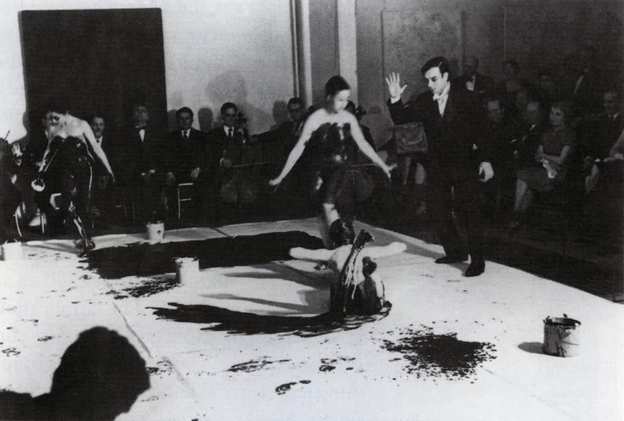 Yves Klein contemporary art performance titled performance Anthropometries of the Blue Period